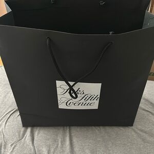 Empty Saks fifth Avenue shopping bag
